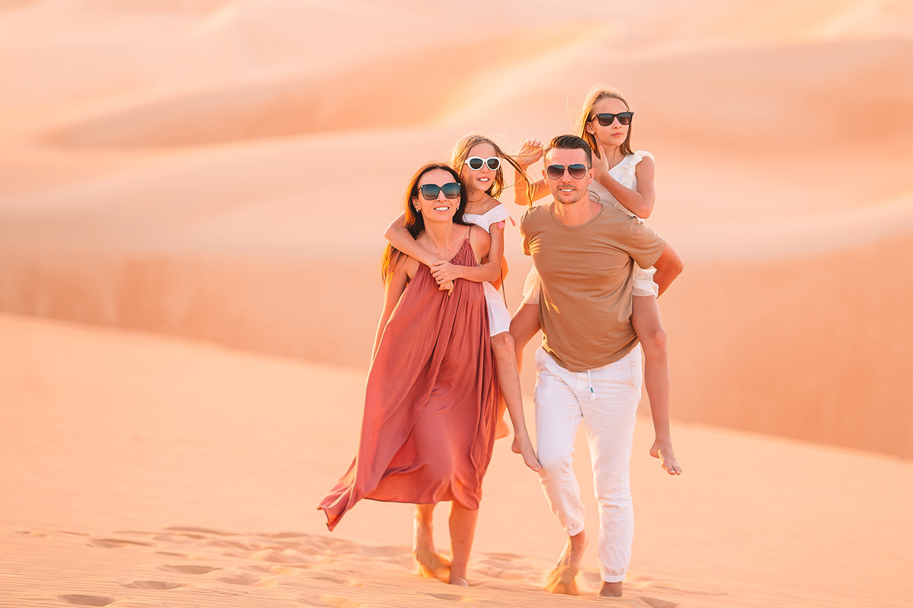 Family during Dubai Desert Safari at Big Red Dunes